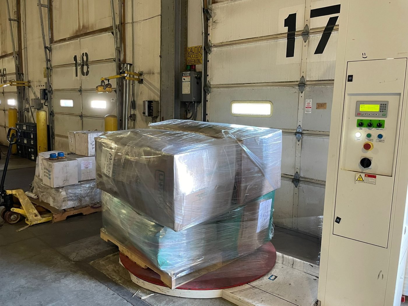 A wrapped pallet at the loading bay, ready to ship
